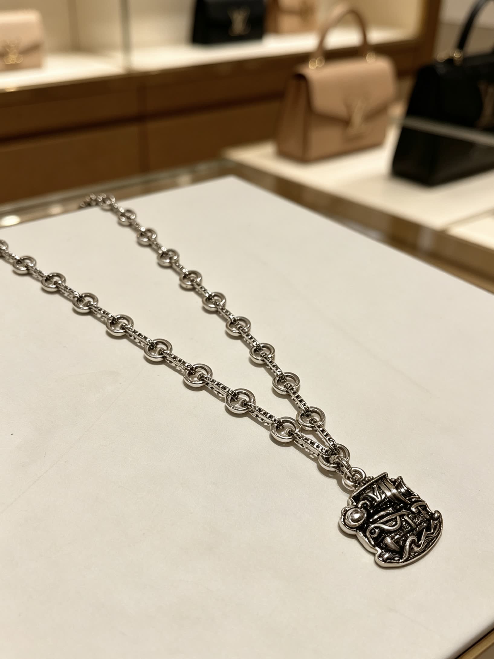 Louis Vuitton Silver Chain with Pirate Ship Pendant